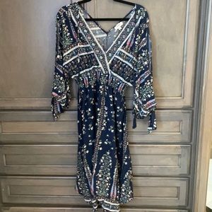 Handkerchief hem dress. 3/4 length sleeve